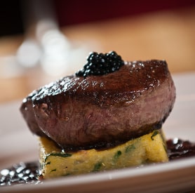Filet mignon on a potato croquette